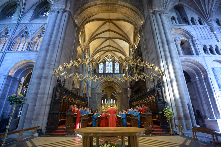 Choristers singing in Hereford Cathedral